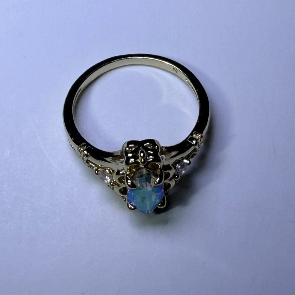 Fragrant Jewels Gold Tone Marquise Iridescent Stone Filigree Bow Ring Size 8.25